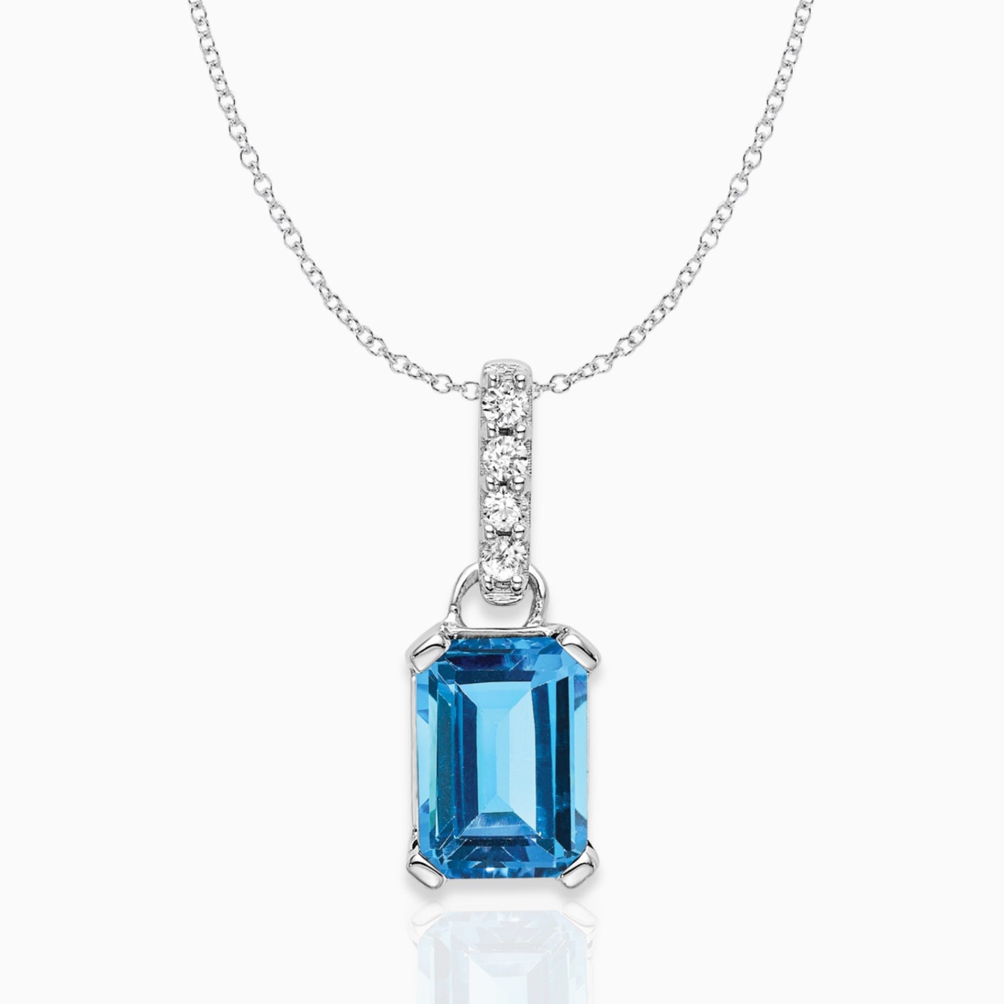 Emerald-Cut Blue Topaz & Diamond Solitaire Pendant 14k White Gold Birthstone Karat Designs